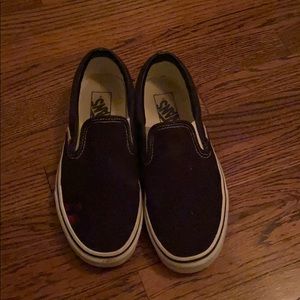 Black low top vans with minor bleach stain